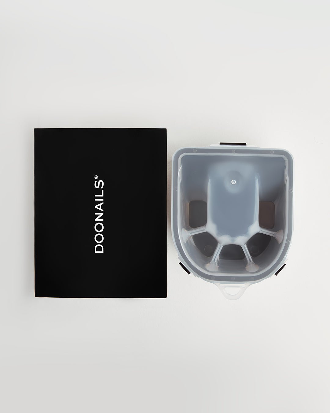 Doonails Remover Bowl mit Verpackung von oben fotografiert