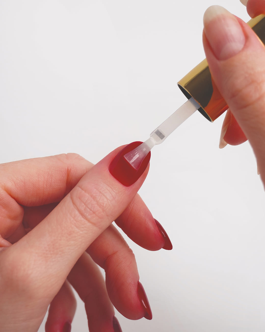 Top Coat bei der Anwendung